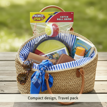 Load image into Gallery viewer, Woven basket with beach items including a ball, towel, and sunscreen on a wooden surface.