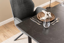 Load image into Gallery viewer, a modern dining table by homestreet with plates and cutlery on top showcasing the marble look top