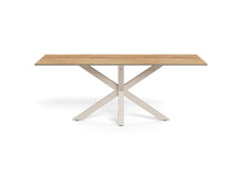 Load image into Gallery viewer, A modern rectangular dining table with a light oak wood top and a white painted metal X-shaped base, shown on a solid white background.