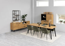 Load image into Gallery viewer, Dining room with wooden furniture, including a table and chairs, in a modern interior setting.