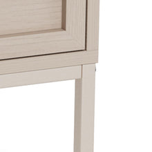 Load image into Gallery viewer, Close-up detail of a light beige wood furniture piece showing the corner of a drawer or cabinet and a leg on a white background.