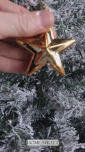 Load and play video in Gallery viewer, Pack Of 10 Star Christmas Hanging Baubles Tree Trims In Choice Of Gold, Silver, Or Red