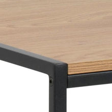 Load image into Gallery viewer, Close-up of a wooden table corner with black metal frame