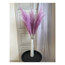 Load image into Gallery viewer, 3 stems of lilac pampas grass in a white glass vase on a black lamp table by Homestreet