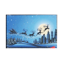 Load image into Gallery viewer, Mini LED Light Up Christmas Hanging Or Standing Canvas Picture 15x10cm Santa Sleigh City Scene