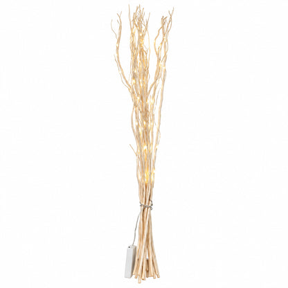 A bundle of decorative artificial branches tied with a string, glowing with warm white LED fairy lights, shown on a plain white background.