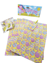 Load image into Gallery viewer, Easter treat bags with egg pattern and packaging on a whte surface
