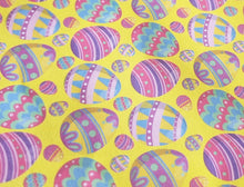 Load image into Gallery viewer, Pattern of colorful Easter eggs on a yellow background
