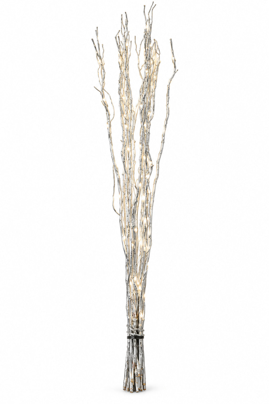 A decorative silver artificial tree branch arrangement with small warm white string lights, standing on a white background
