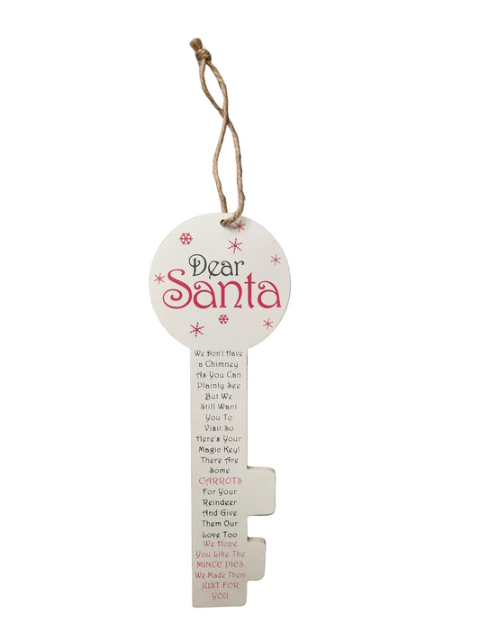 A wooden key-shaped Christmas ornament with a hanging twine loop, featuring a round top with 'Dear Santa' in red and black lettering, and the Santa Clause poem printed down the key in black and red text on a white background.