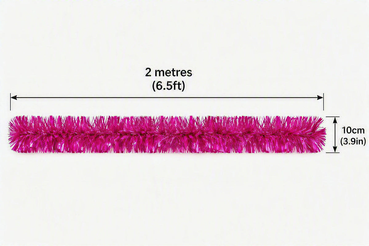 A bright pink metallic tinsel garland shown horizontally on a white background, with measurement arrows and text indicating a length of 2 metres (6.5 ft) and a width/thickness of 10 cm (3.