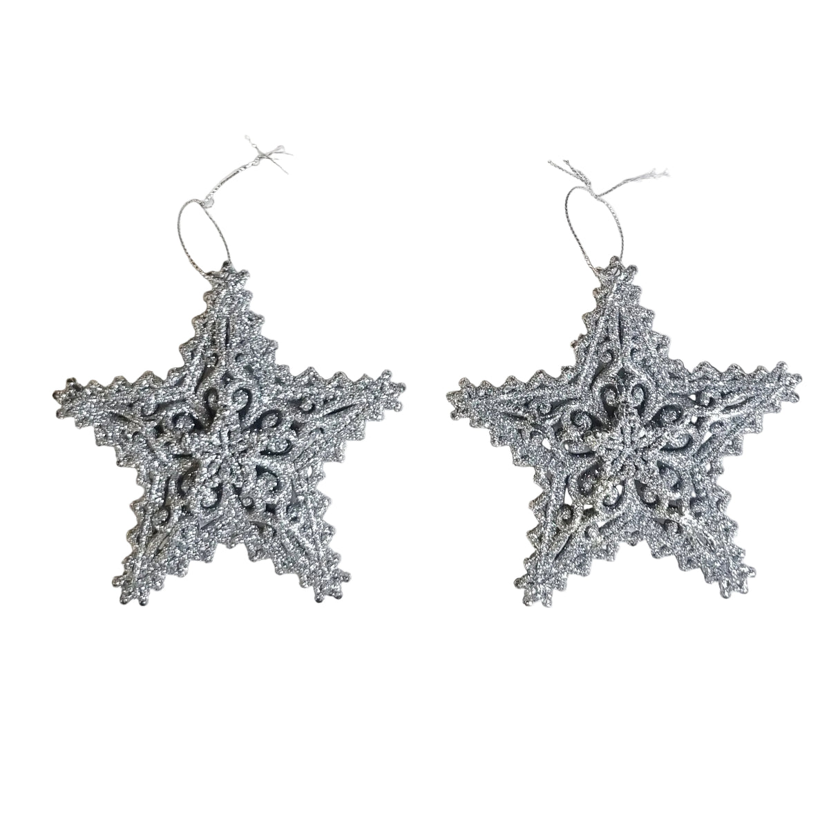 Two silver glittery star-shaped Christmas ornaments with hanging loops, displayed side-by-side on a plain off-white background.