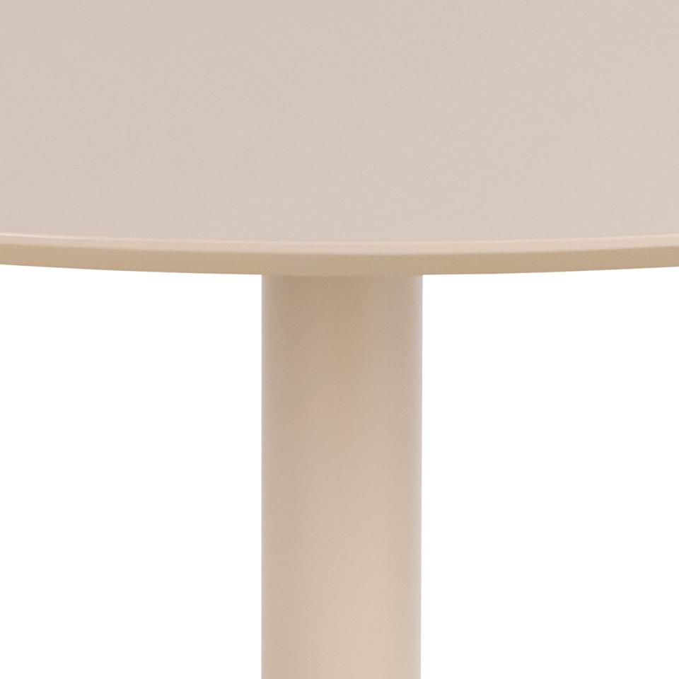 Close-up of a beige table leg on a white background
