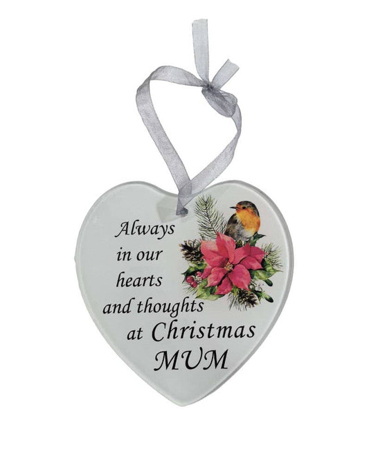 a glass heart on a white background with a special memorial message that reads, 'always in our hearts and thoughts at Christmas MUM'.