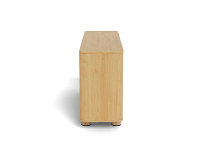 A light natural wood sideboard or cabinet with rounded top corners and small round feet, shown from a direct overhead angle on a white background.
