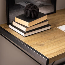 Load image into Gallery viewer, Stack of books with a decorative sphere on a wooden surface
