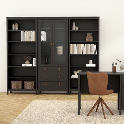 Barcelona black bookcases beside a glazed display cabinet in a styled home office