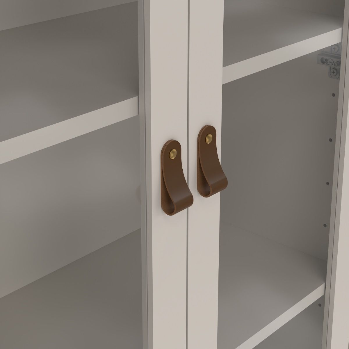 Greige framed glass cabinet doors with brown handles and adjustable shelving viewable inside