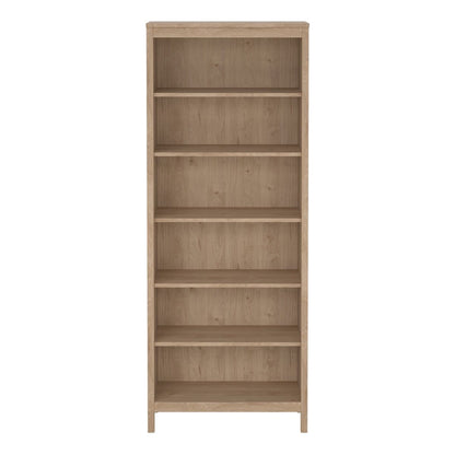 Front view of the Barcelona bookcase in oak on a white background