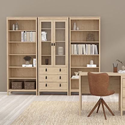 A modern home setting with a Barcelona bookcase either side of a Barcelona cabinet in oak
