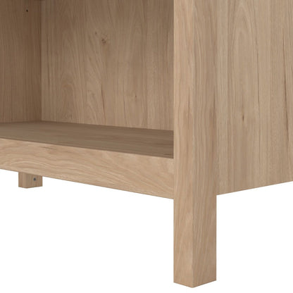 close up view of the leg of an oak Barcelona bookcase on a white background