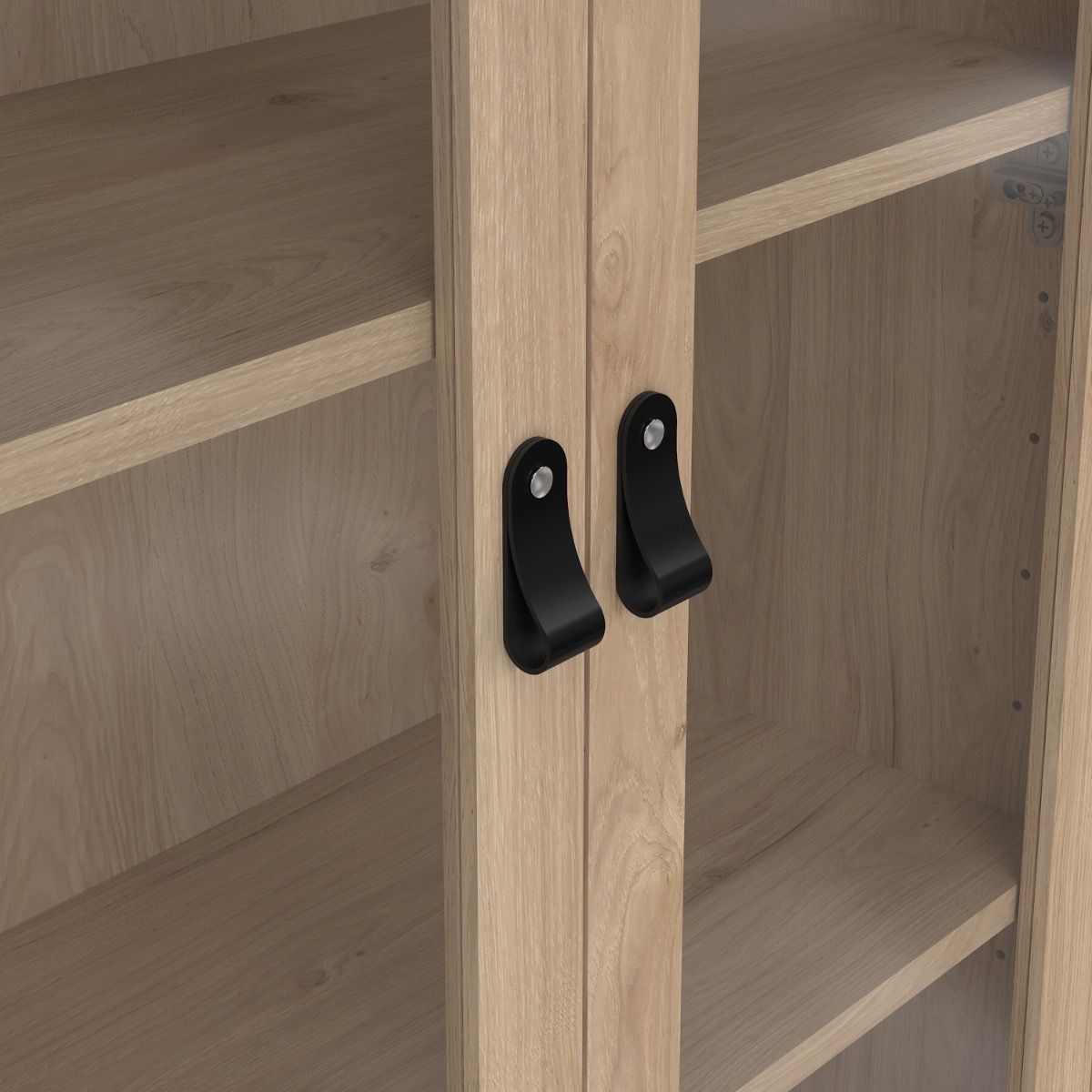 Wooden glass doors from a Barcelona cabinet cabinet with black leather strap handles with the adjustable shelving in view