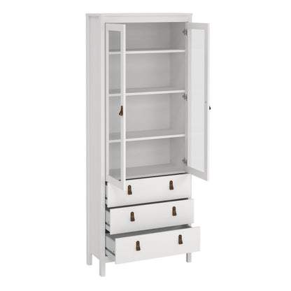 A tall white storage cabinet with two glass-front upper doors, open to reveal three interior shelves, and three drawers at the bottom with dark metal handles, shown on a plain white background.