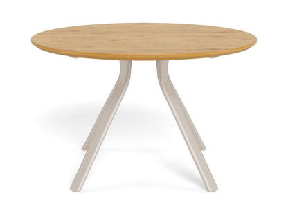 A round Bristol dining table with oak melamine top and grey metal base on a white background