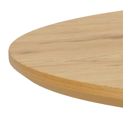 close up of a corner of a light oak melamine dining table on a white background