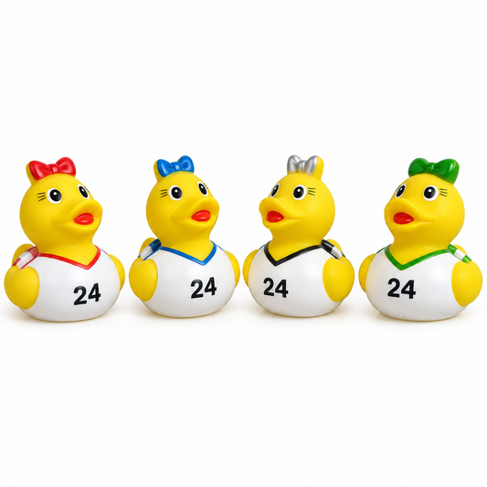 Four rubber ducks wearing cheerleader-style jerseys with the number 24, each with a different colored bow and collar trim, arranged in a row on a white background.