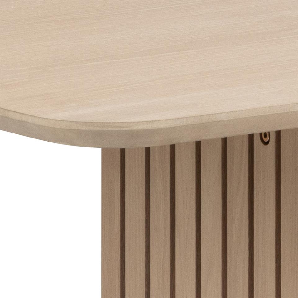 Close-up of a wooden table with a slatted base on a white background