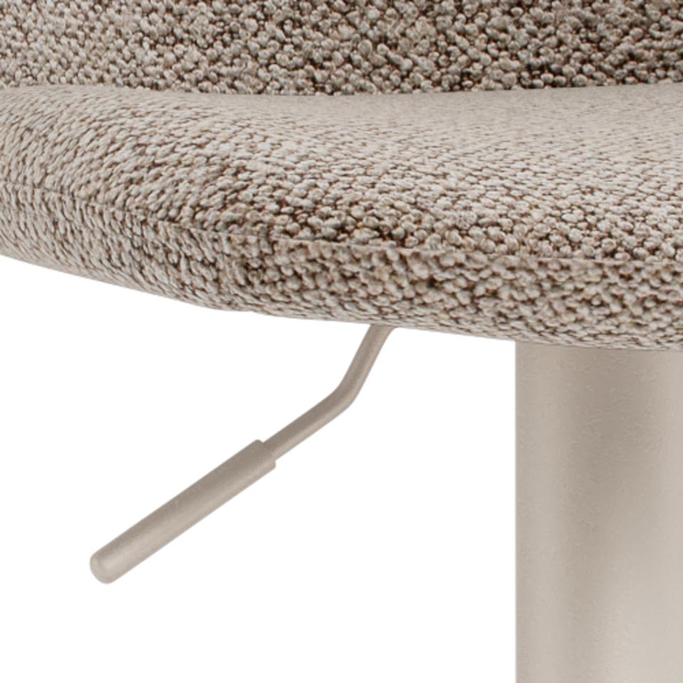 Close-up of a textured bar stool seat and adjustment lever with a white background