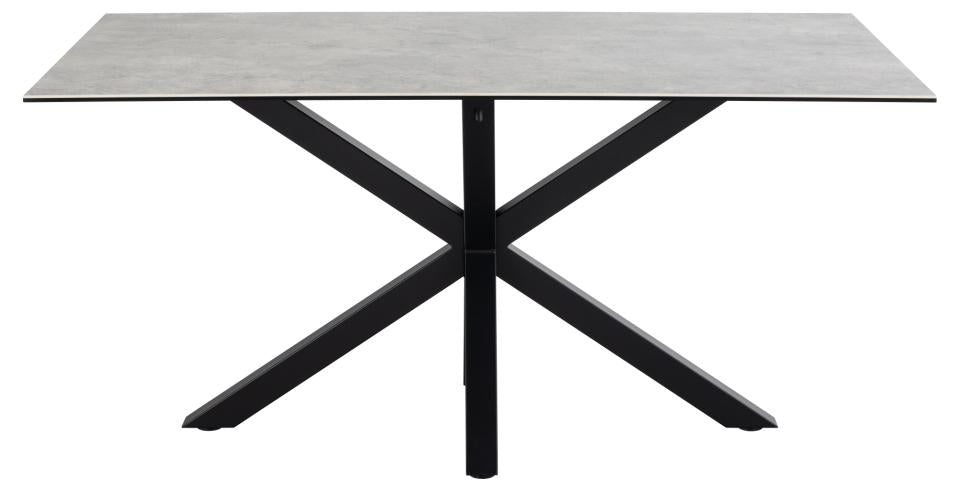 Table with a gray top and black metal legs on a white background