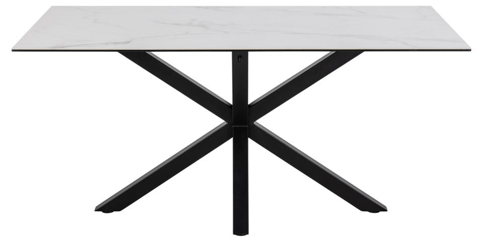 A rectangular dining table with a white marble-patterned top and a black metal X-shaped pedestal base, shown against a plain white background.