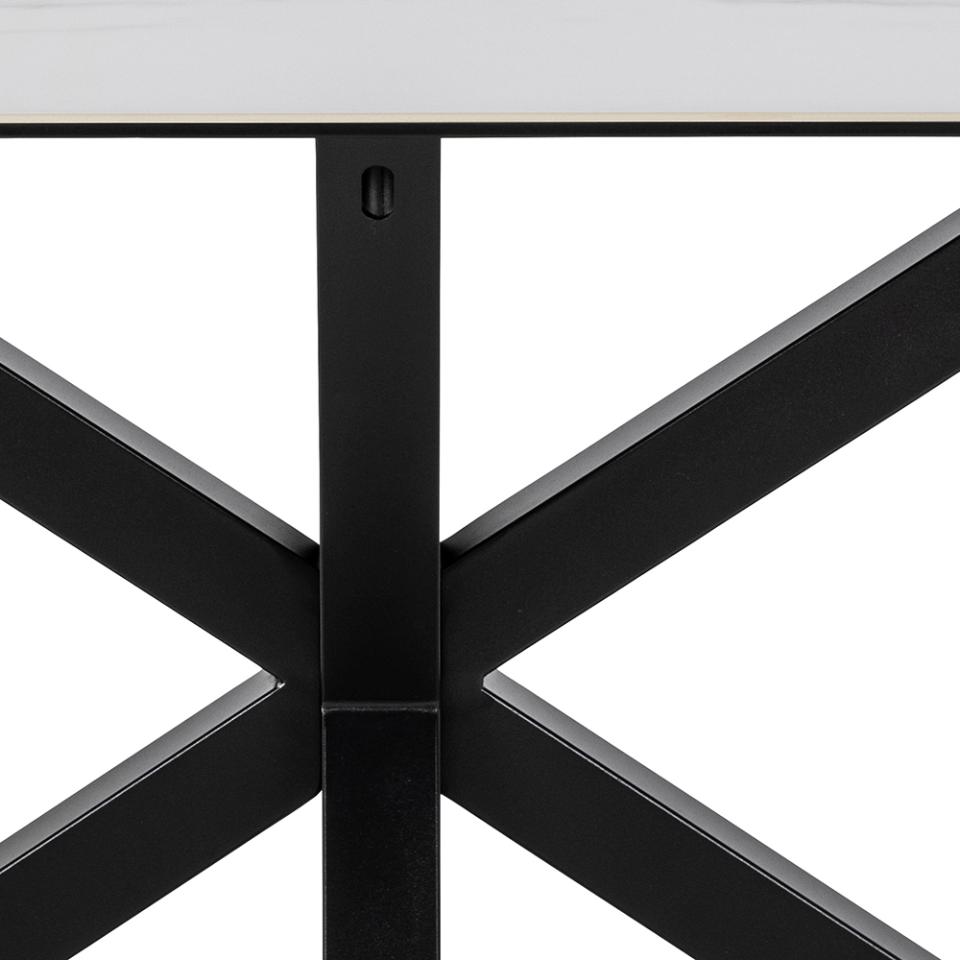 Close-up of a black metal frame with a white background