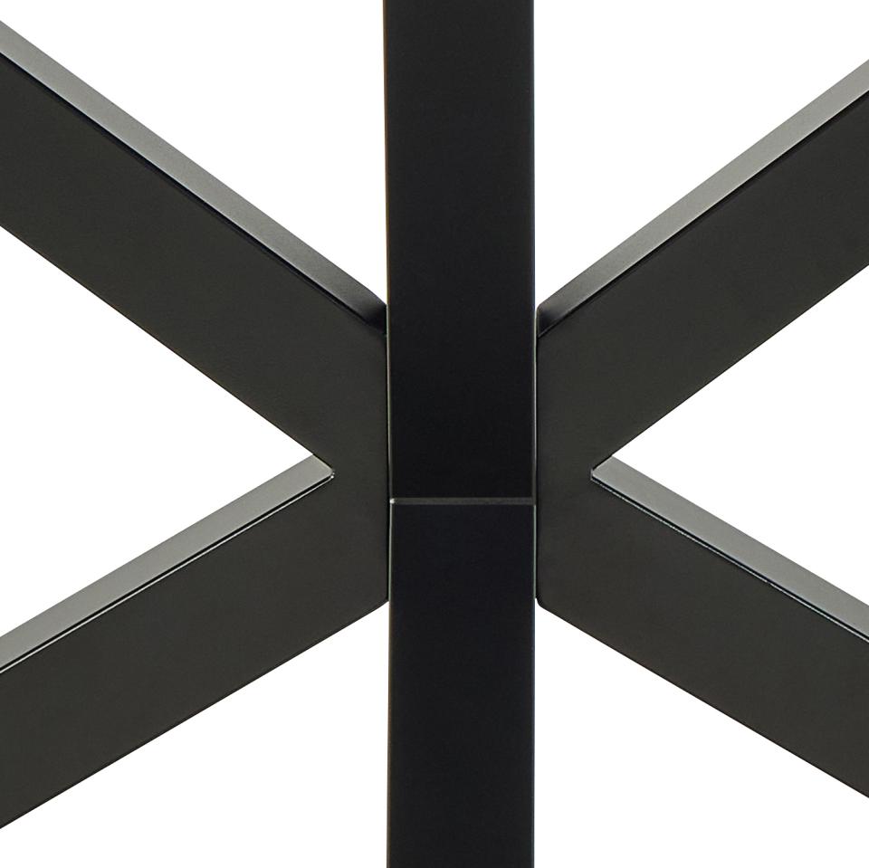 Close-up of a black metal table crossbar on a white background
