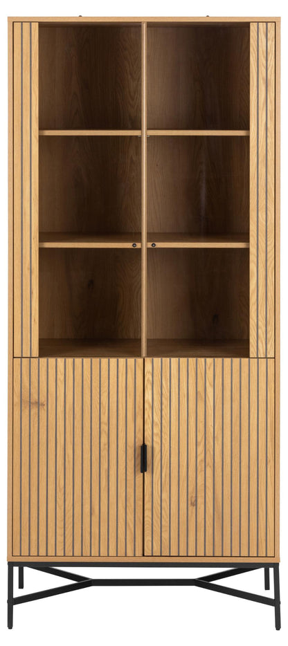 A tall wooden Jaipur cabinet with a slatted wood lamella design, featuring two open upper shelves, two glass-front upper doors, two lower slatted doors, and a black metal X-frame base, shown against a plain white background.