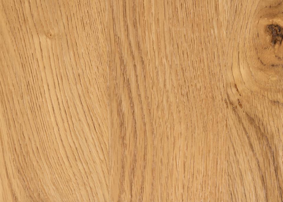 Close-up of a wooden surface with visible grain and texture