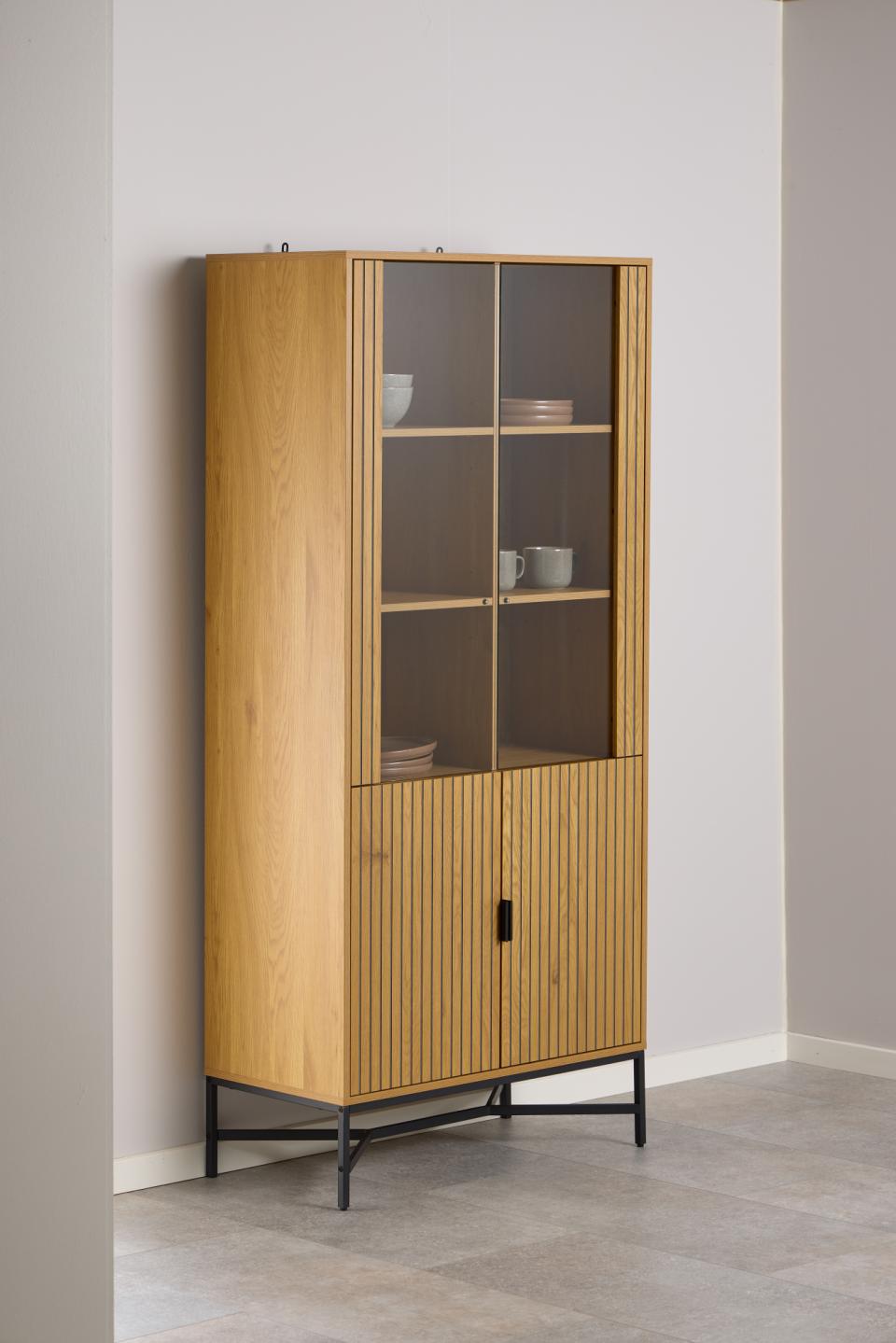 Wooden Jaipur display cabinet with glass doors against a white wall