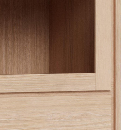 Close-up of a light oak wood cabinet showing both the outer front panel and the inner back panel with visible wood grain texture.