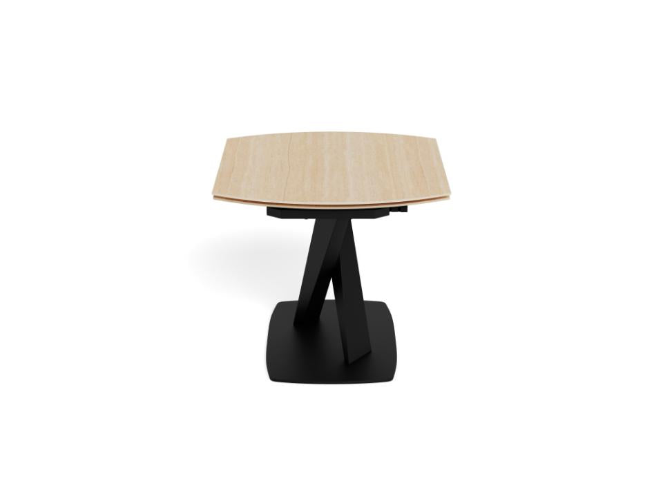 A modern extendable dining table with a light beige ceramic hexagonal top and a black metal A-frame pedestal base, shown on a solid white background.