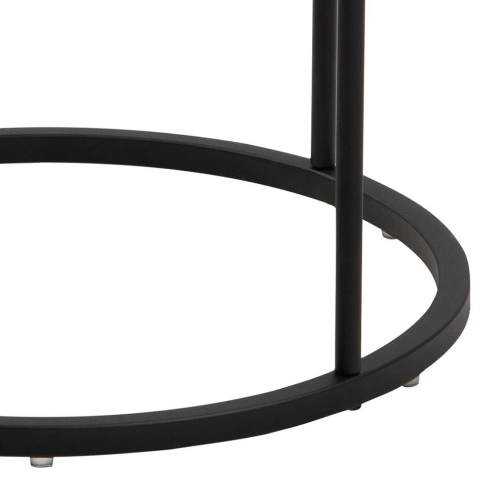 Close-up of a black metal circular object on a white background