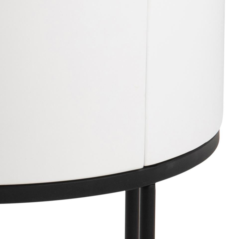 Round table with white top and black base on a white background