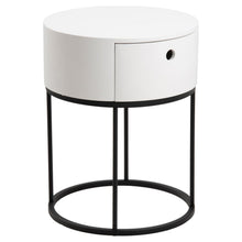Load image into Gallery viewer, A modern round side table with a white cylindrical cabinet body and a black metal wire frame base, shown on a plain white background.
