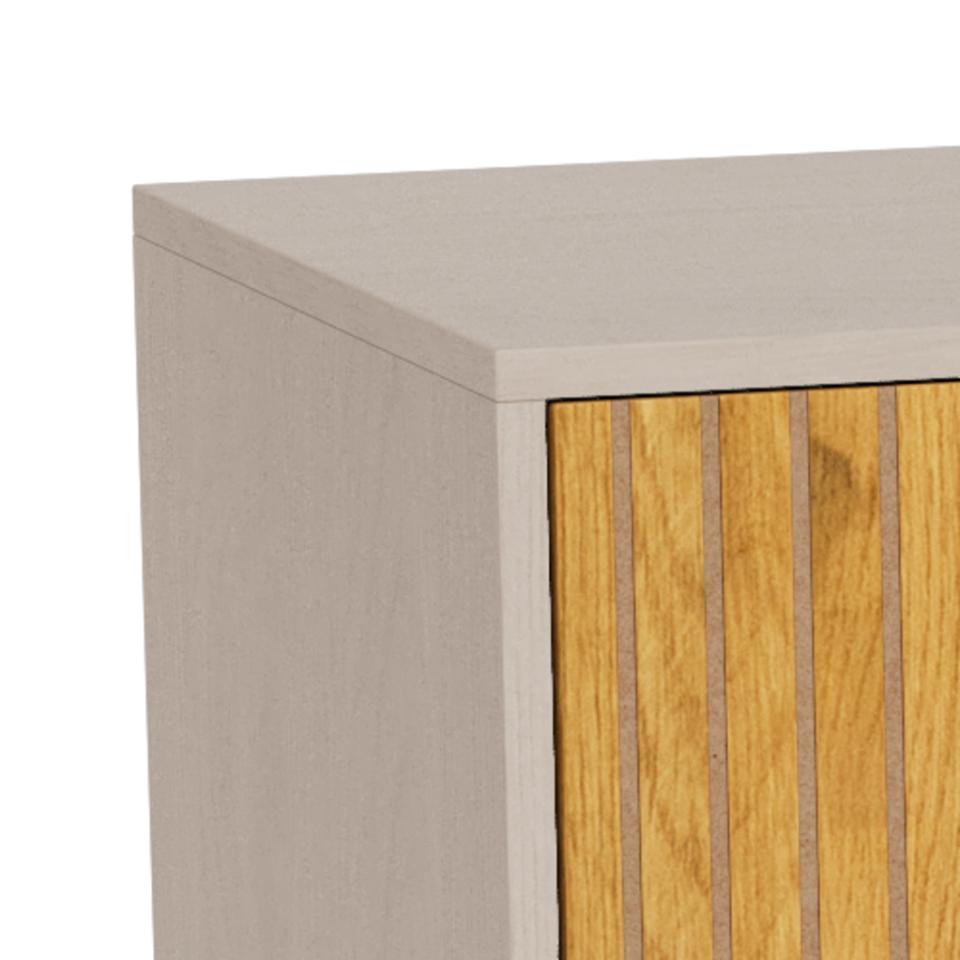 Close-up of a furniture piece showing a grey side panel, top surface, and vertical wood slat doors in a warm golden-brown tone against a white background.