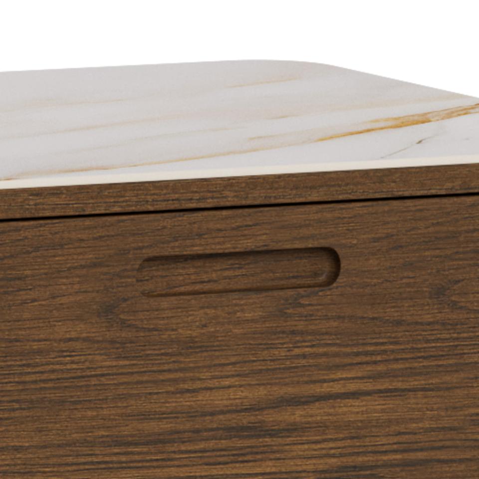 Close-up of a wooden Southampton sideboard with a dark brown wood grain front and a light beige marble-patterned ceramic top, featuring a recessed handle cutout.