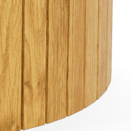 Close-up of a wooden dining table base with a white background