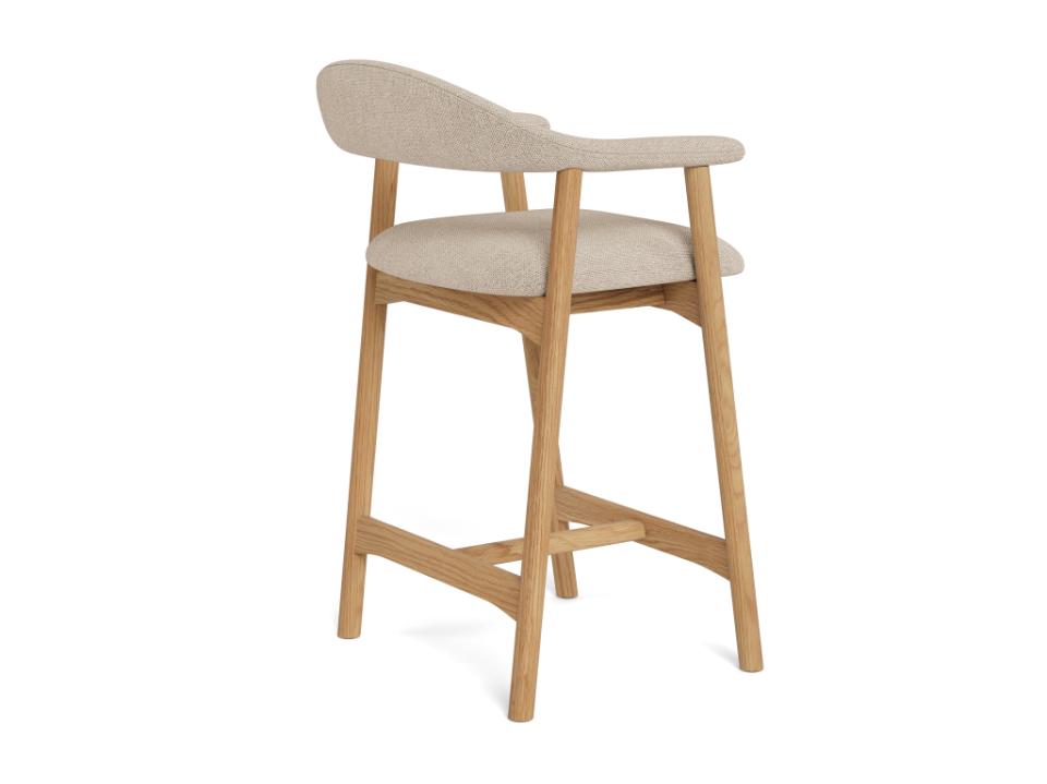 Beige bar stool with wooden legs on a white background