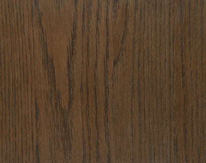Close-up of a wooden surface with a dark brown color and visible grain pattern.