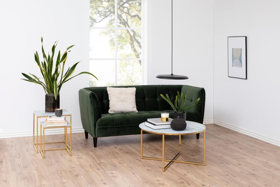 a roomset containing a square alisma nest of tables and an alisma coffee table with a sofa